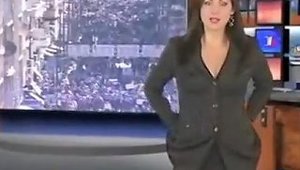 Brunette Beauty Strips Nude During A News Broadcast