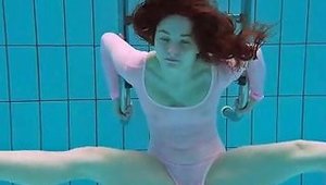 Teen In A Leotard Goes For A Sexy Swim